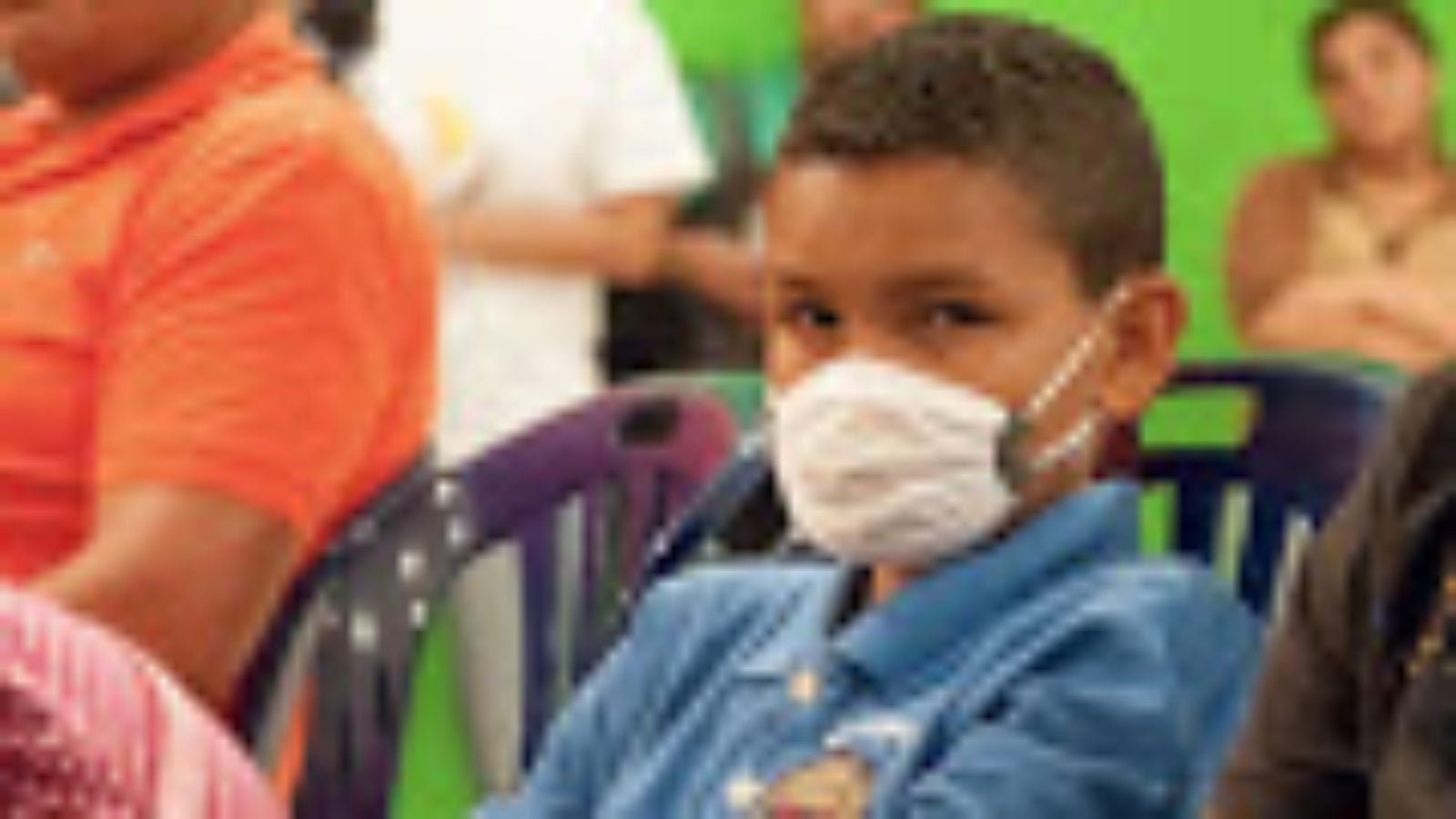 Venezuelan child with mask over face