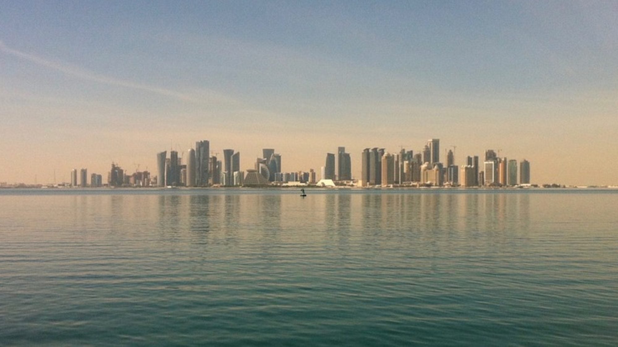 The skyline of Doha, Qatar, taken from the water.