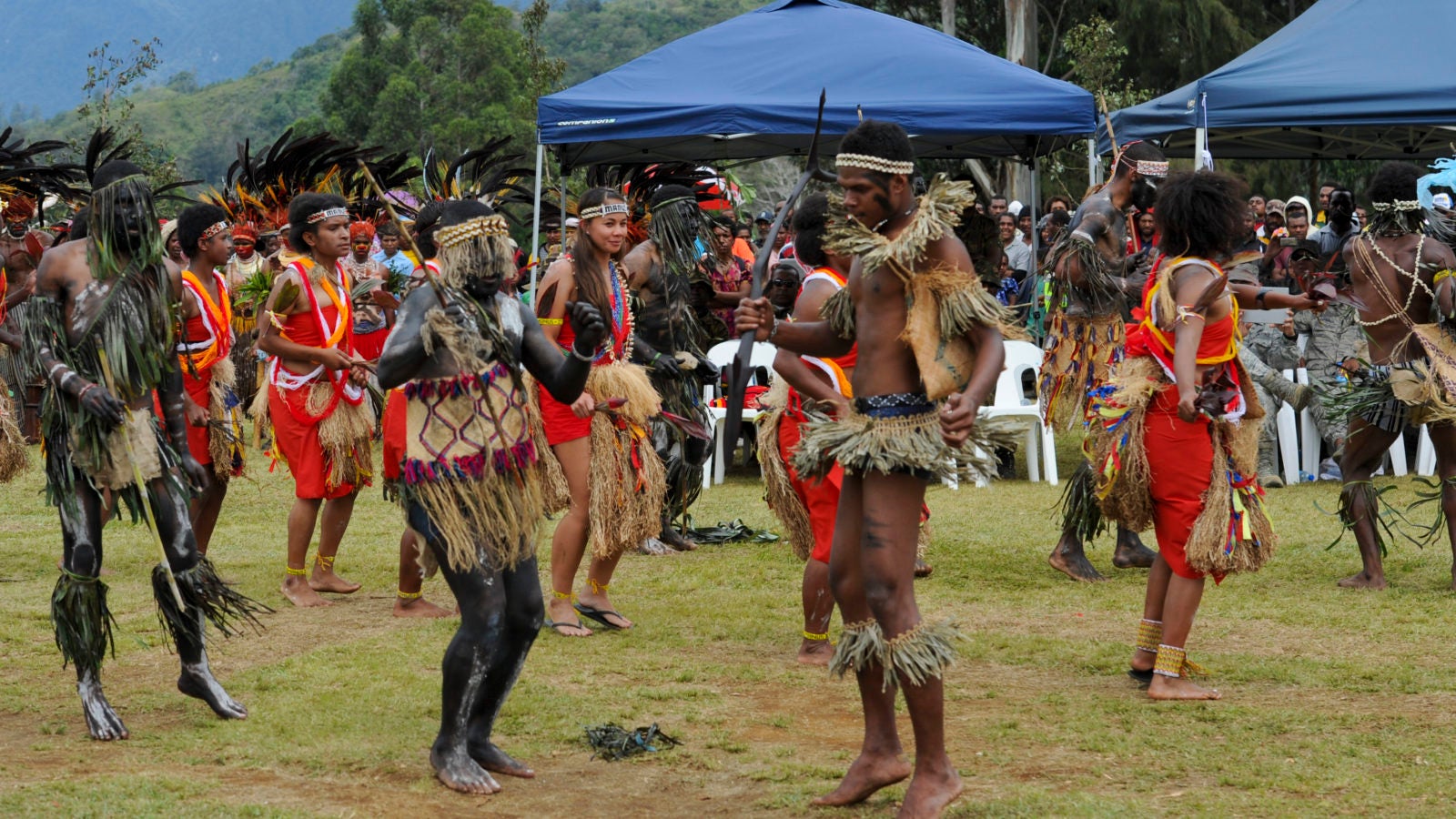 Men and women dancing in Papua New Guinea