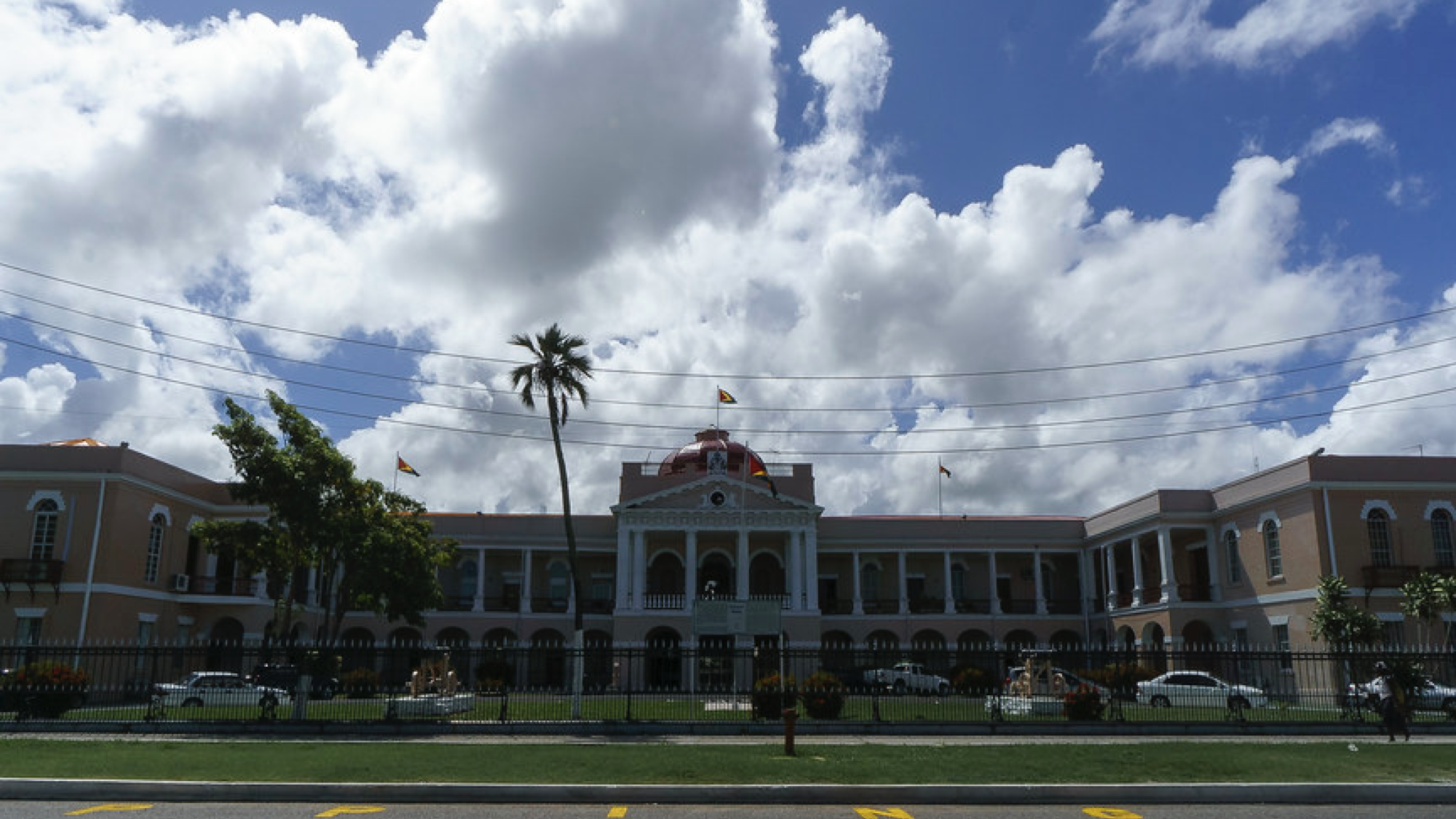 A picture of the front of the national parliament building in Georgetown, Guyana.