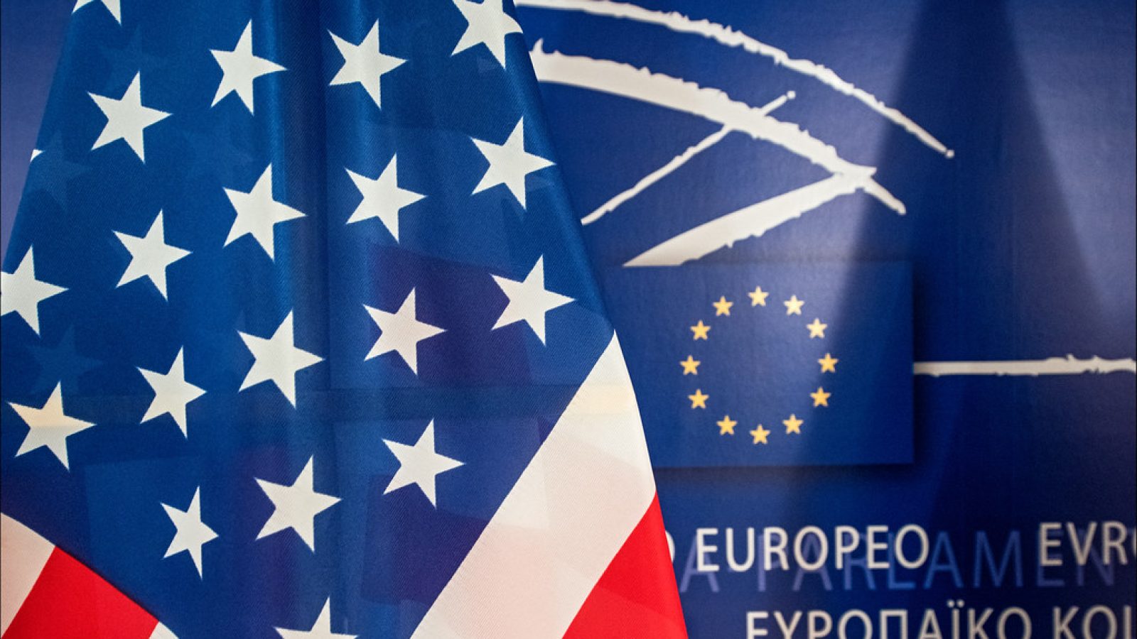 American flag next to European Union background