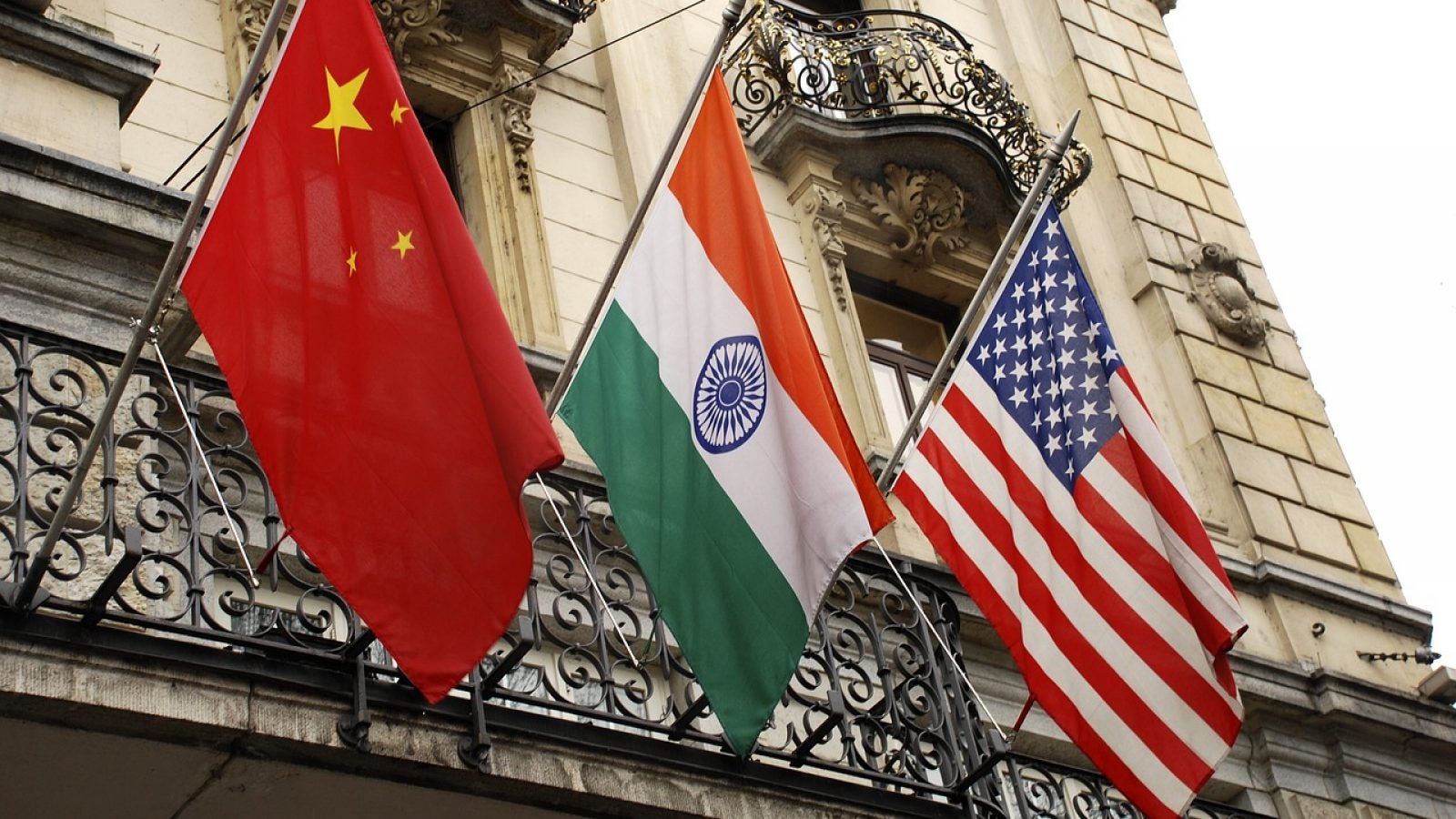 From left to right: the flag of China, India, and the United States