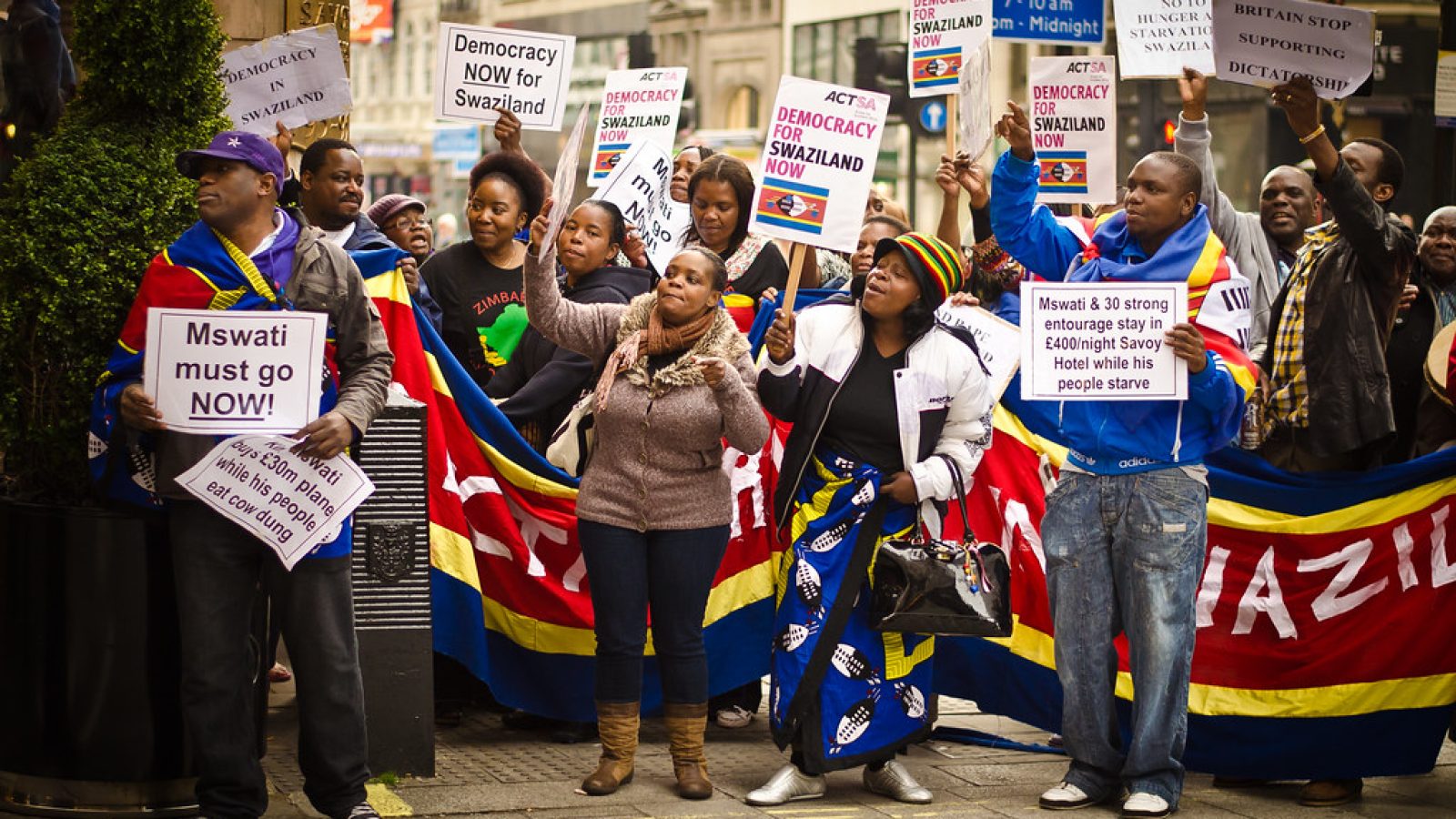 Pro-democracy protestors in Britain outside of the Savoy Hotel