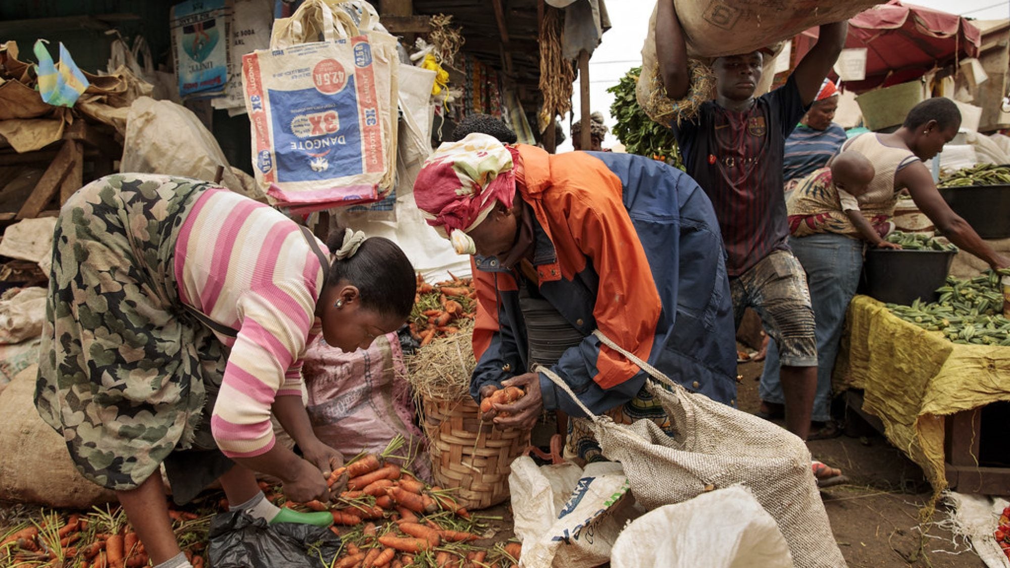 Women selling food at a market in Cameroon