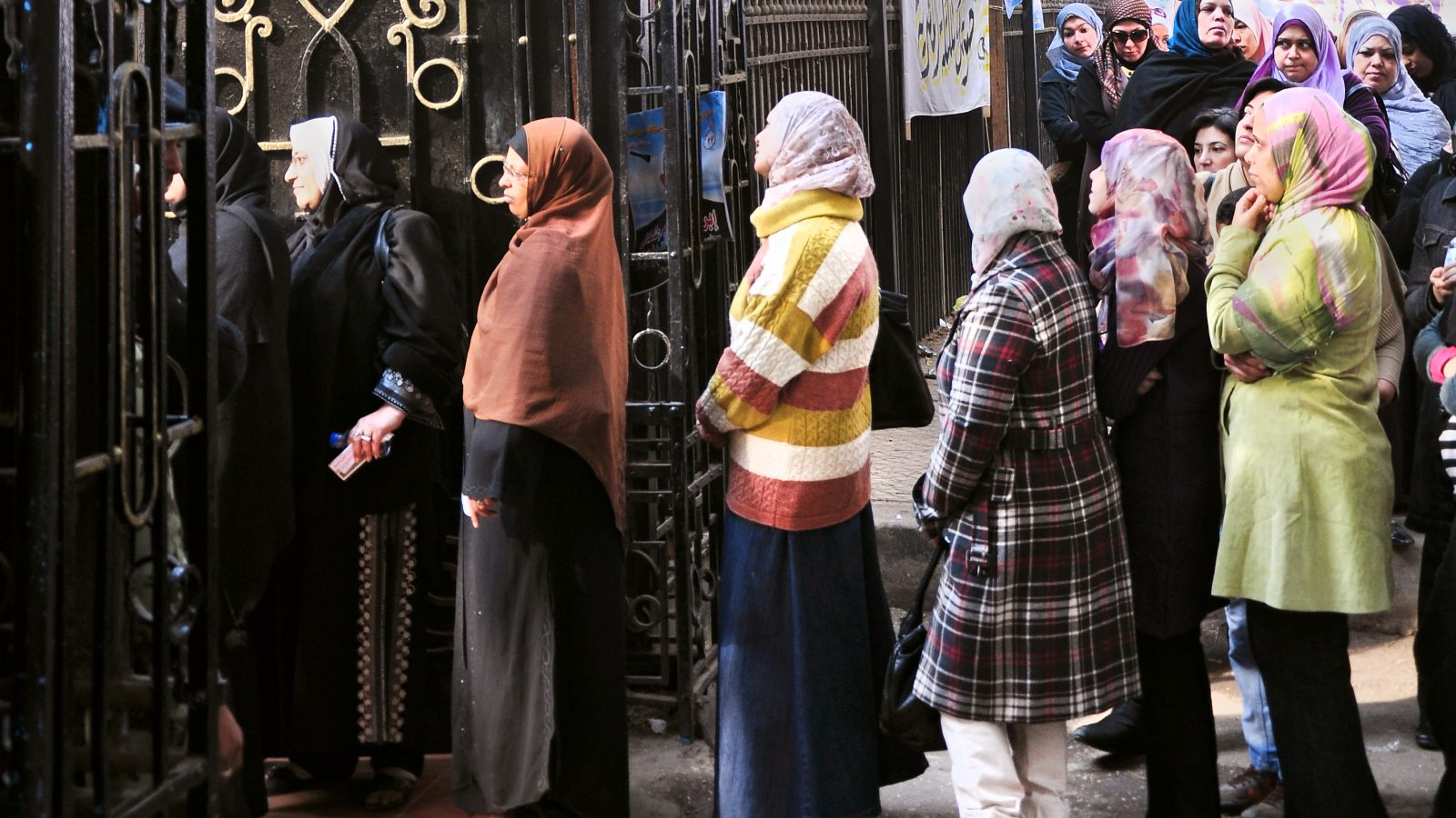 Egyptian women line up to vote in parliamentary elections. Many women ran as candidates in 2011-2012, yet just nine were elected and two appointed.