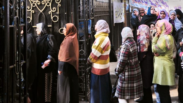 Egyptian women line up to vote in parliamentary elections. Many women ran as candidates in 2011-2012, yet just nine were elected and two appointed.