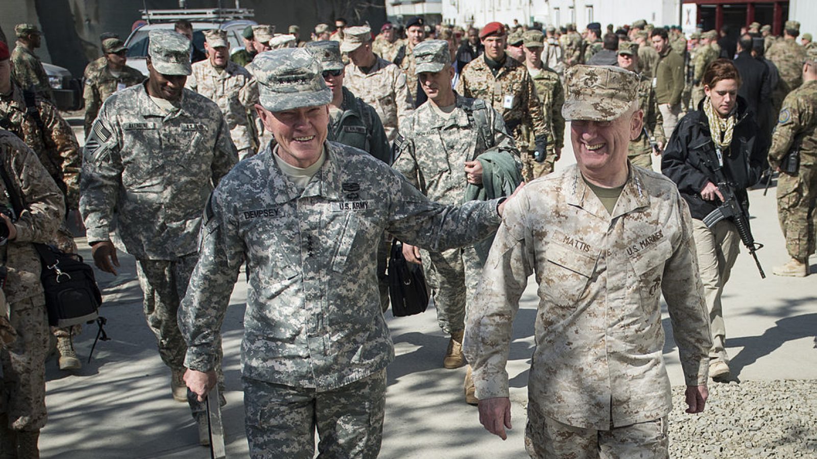 Chairman of the Joint Chiefs of Staff Gen. Martin E. Dempsey and Commander, U.S. Central Command Gen. James Mattis leaving the International Security Assistance Force change-of-command ceremony