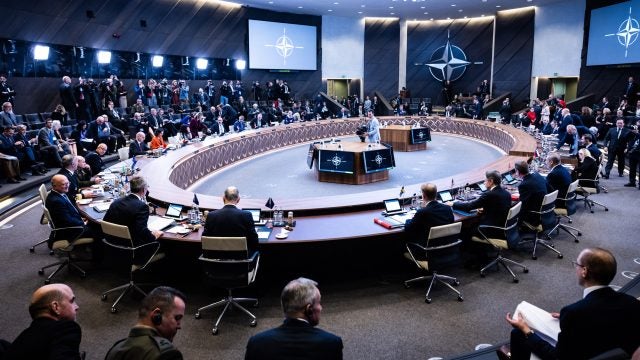 NATO members seated at the meeting