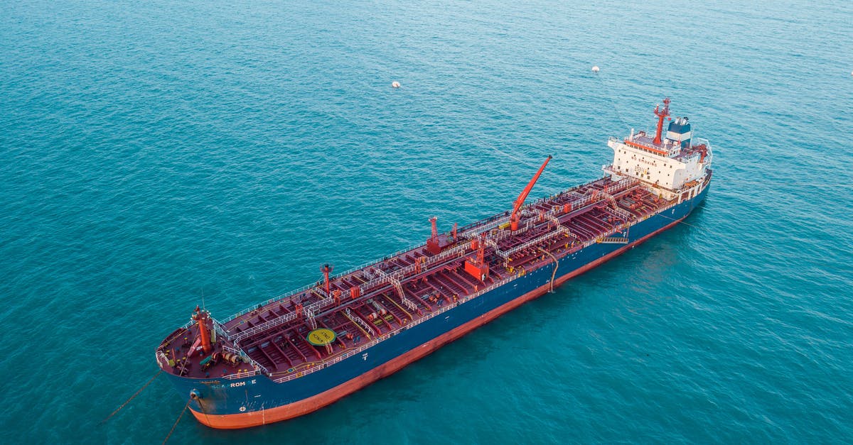 Large shipping vessel in turquoise waters