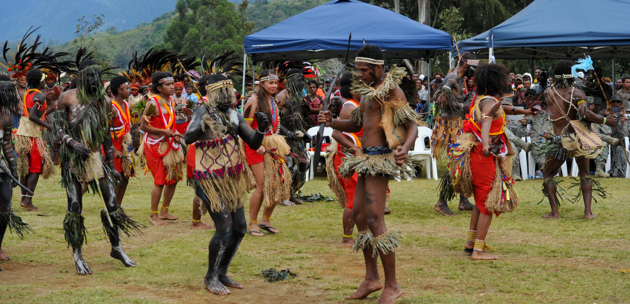 Men and women dancing in Papua New Guinea
