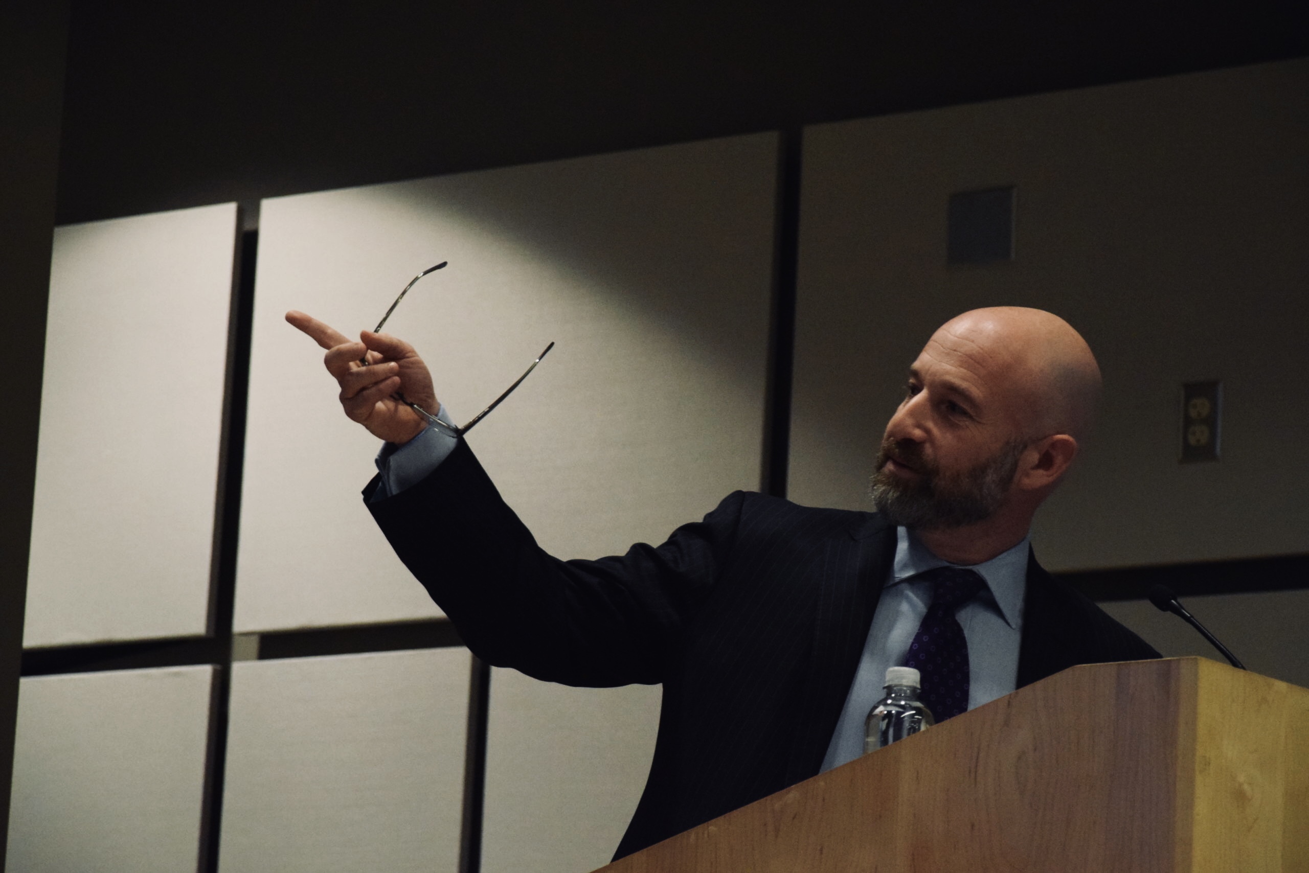 Dr. Singer raises his hand.