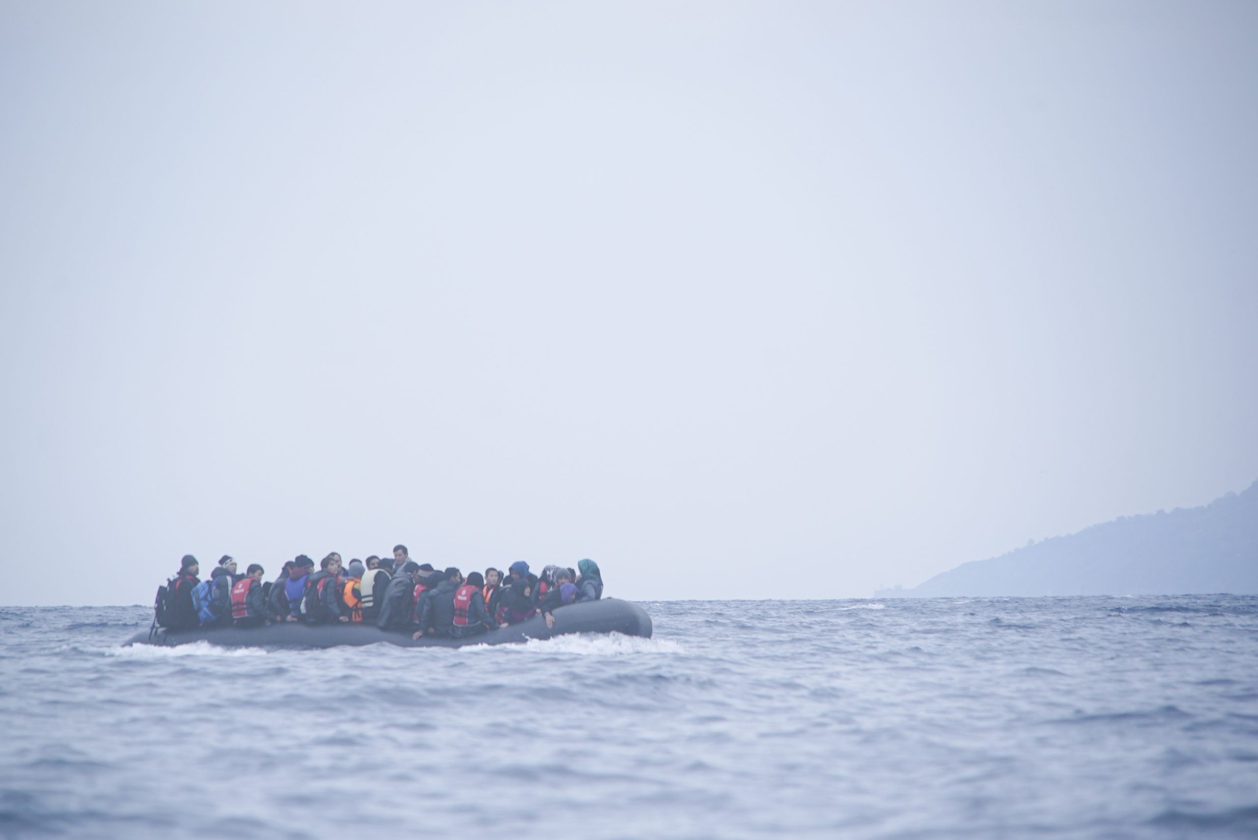 Refugees_on_a_boat_crossing_the_Mediterranean_sea,_heading_from_Turkish_coast_to_the_northeastern_Greek_island_of_Lesbos,_29_January_2016