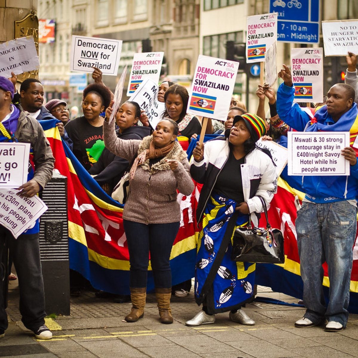 Pro-democracy protestors in Britain outside of the Savoy Hotel