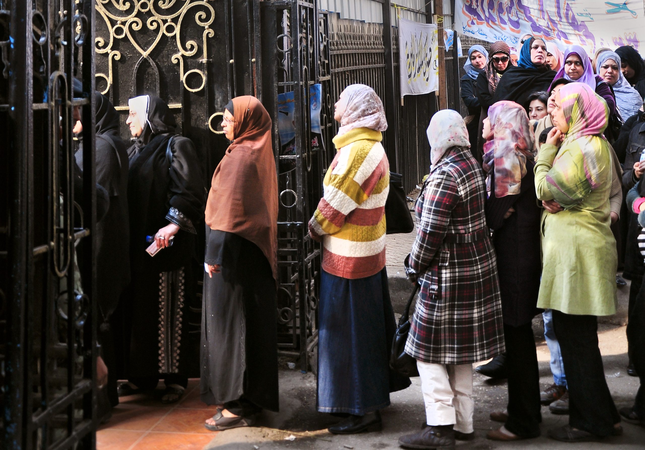 Egyptian women line up to vote in parliamentary elections. Many women ran as candidates in 2011-2012, yet just nine were elected and two appointed.